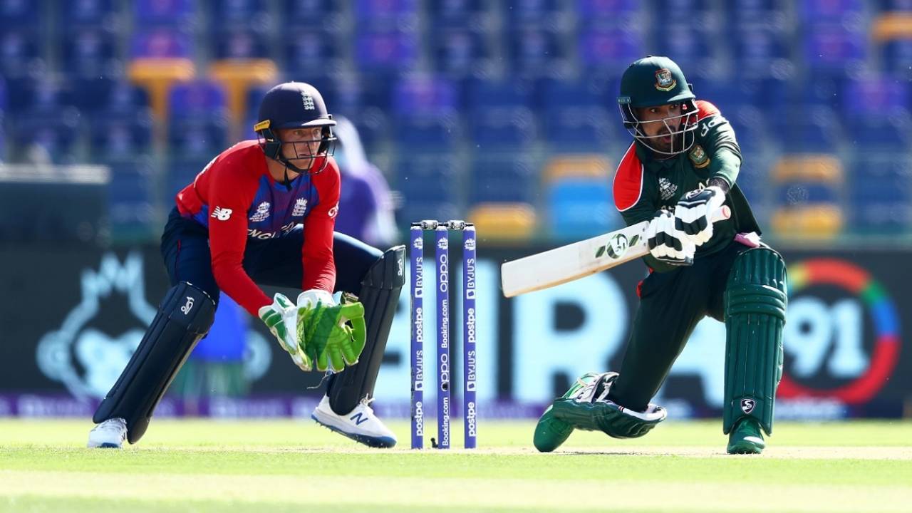 Liton Das plays across the line with Jos Buttler looking on, Bangladesh vs England, T20 World Cup, Group 1, Abu Dhabi, October 27, 2021