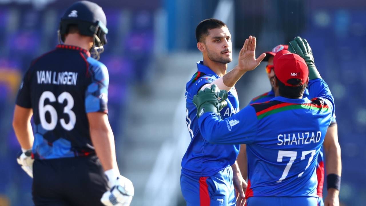 Naveen-ul-Haq celebrates with Mohammad Shahzad, Afghanistan vs Namibia, T20 World Cup, Group 2, Abu Dhabi, October 31, 2021