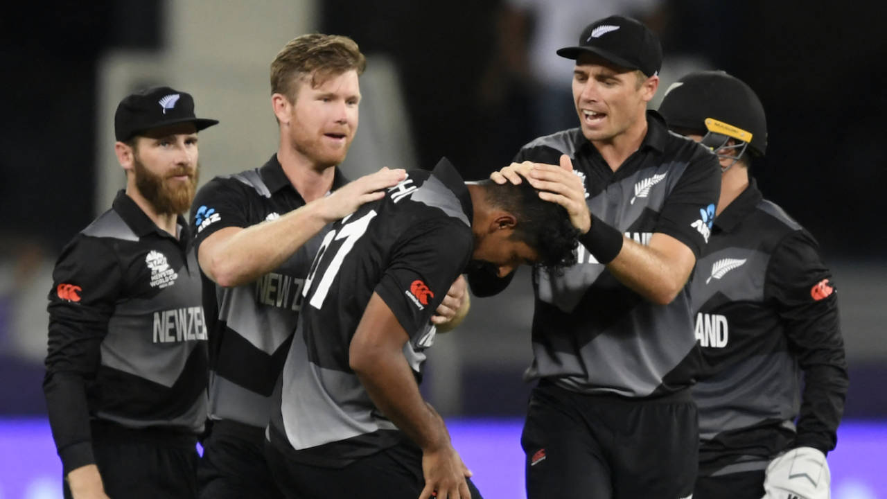 Ish Sodhi is mobbed by his team-mates after getting the wicket of Virat Kohli&nbsp;&nbsp;&bull;&nbsp;&nbsp;AFP/Getty Images