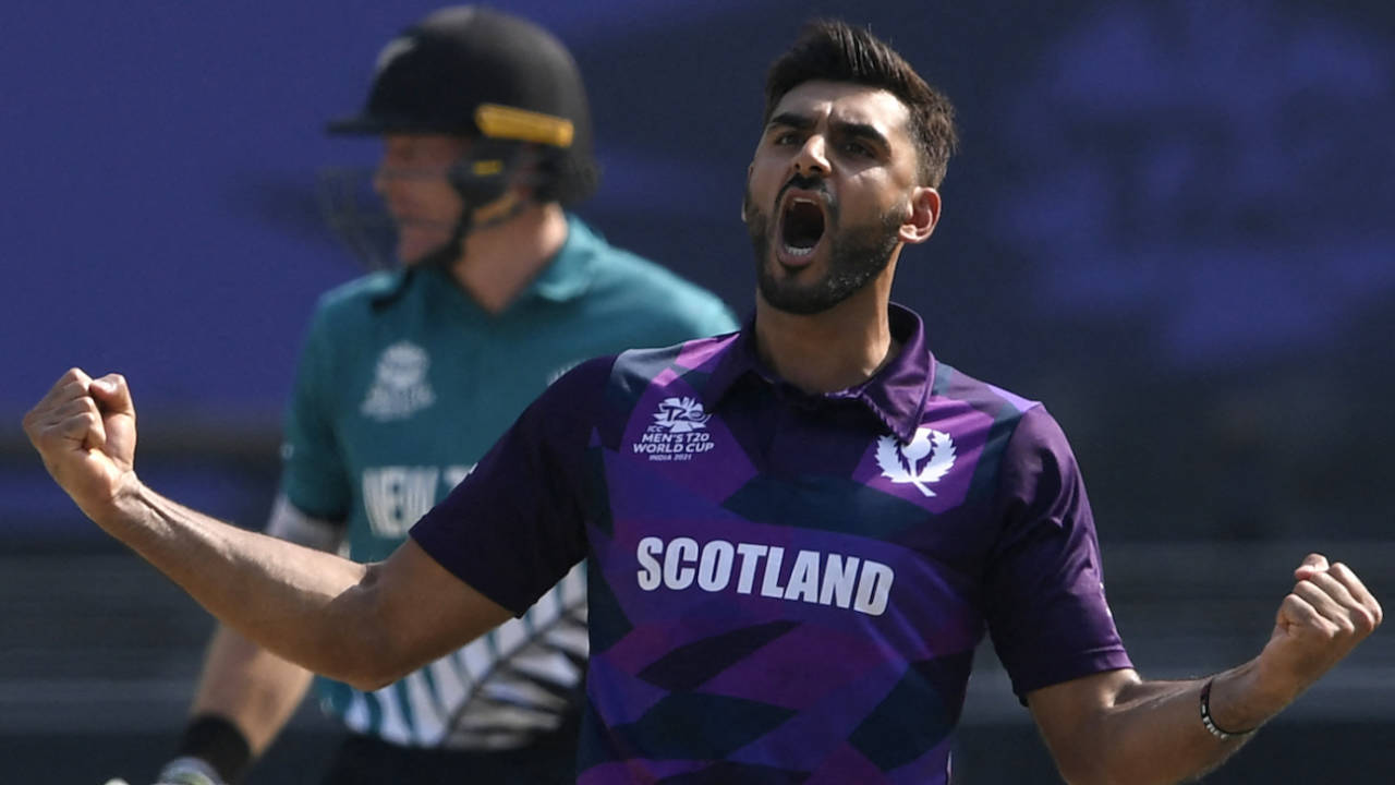 Safyaan Sharif roars after getting the wicket of Daryl Mitchell, New Zealand vs Scotland, T20 World Cup, Group 2, Dubai, November 3, 2021