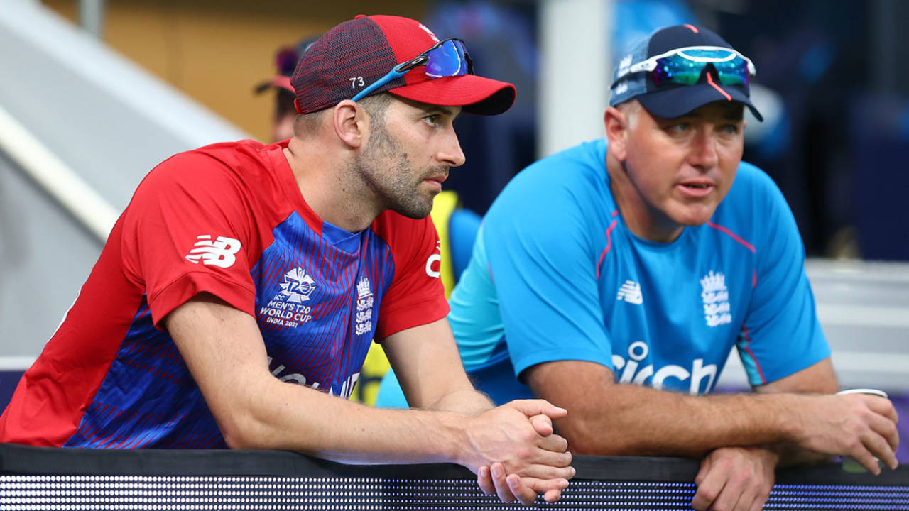 England head coach Chris Silverwood in conversation with bowler Mark Wood, ICC Men's T20 World Cup, England vs West Indies, Dubai, October 23, 2021