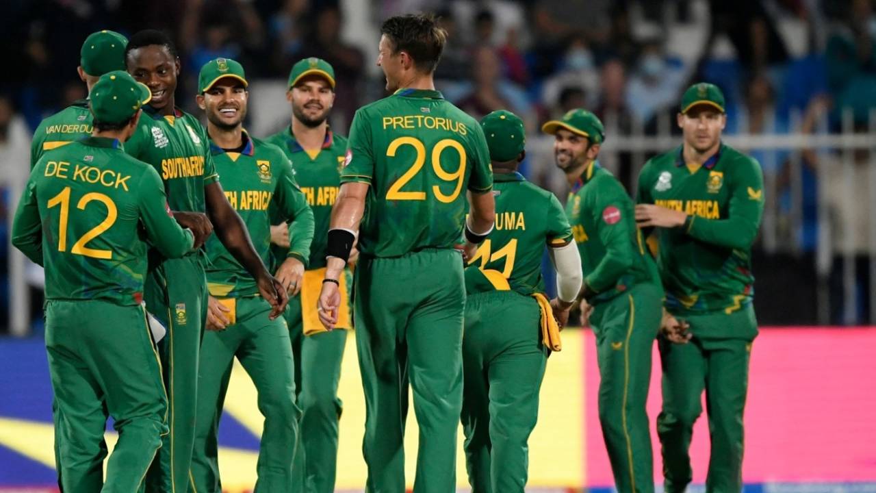 The South Africa players gather to celebrate Kagiso Rabada's hat-trick, England vs South Africa, T20 World Cup 2021, Sharjah, November 6, 2021