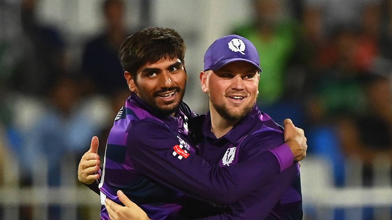 Hamza Tahir celebrates Mohammad Rizwan's wicket with Mark Watt