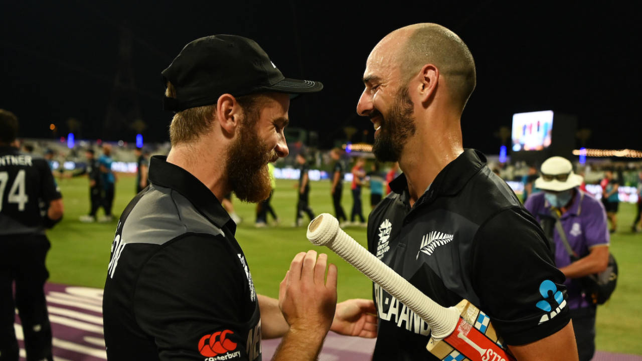 Kane Williamson congratulates his hero of the evening, Daryl Mitchell, after the win, England vs New Zealand, T20 World Cup, 1st semi-final, Abu Dhabi, November 10, 2021
