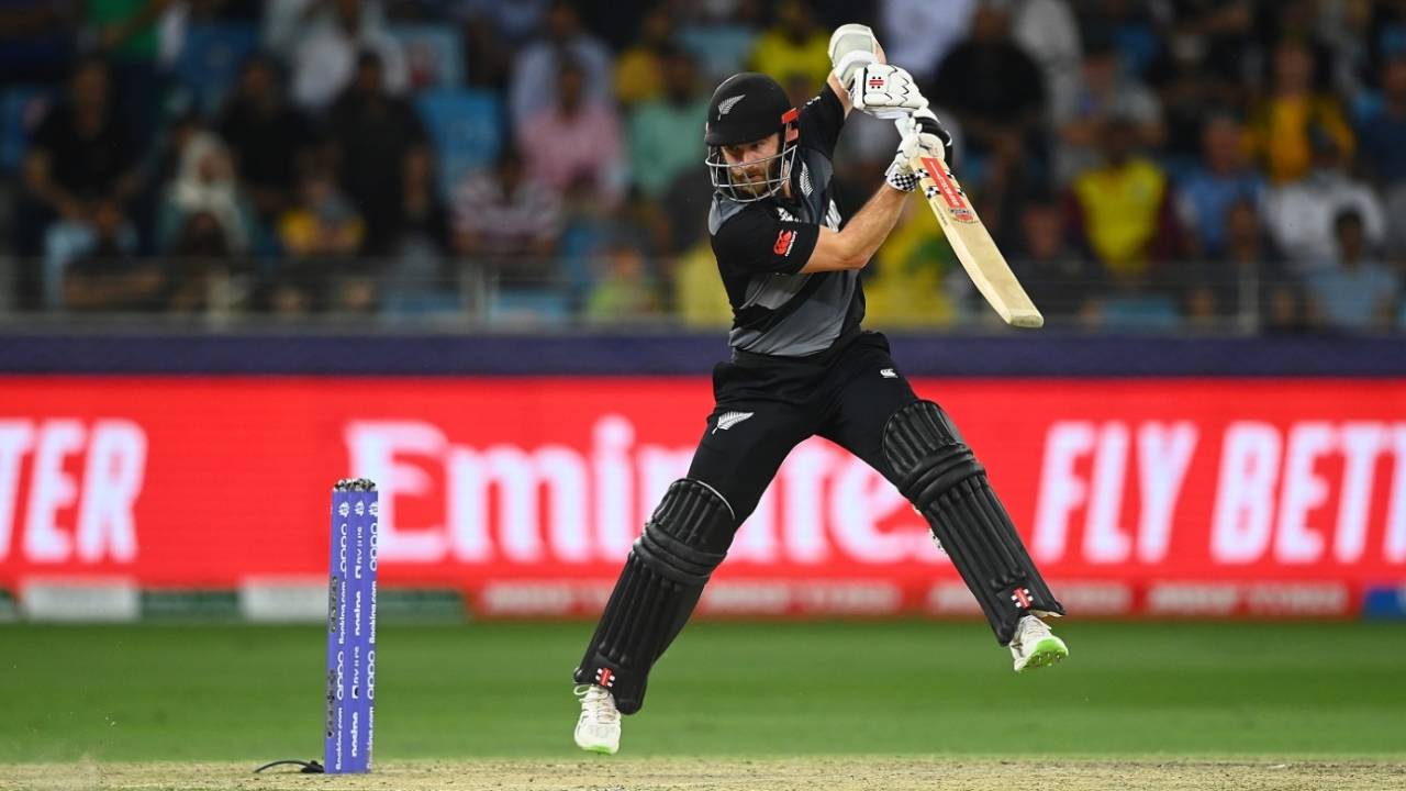 An airborne Kane Williamson punches one through the off side, Australia vs New Zealand, T20 World Cup final, Dubai, November 14, 2021