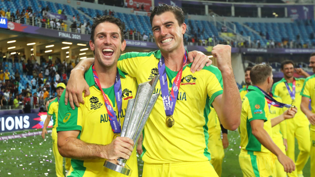 Mitchell Marsh and Pat Cummins celebrate with the trophy, Australia vs New Zealand, T20 World Cup final, Dubai, November 14, 2021