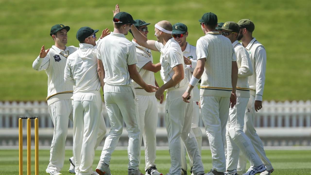 Seth Rance celebrates a wicket with his team-mates, Wellington vs Central Districts, Plunket Shield 2021, Wellington, November 15, 2021