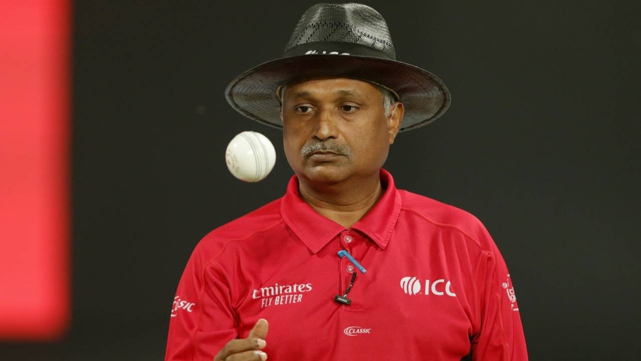 Umpire KN Ananthapadmanabhan tosses the ball up, India vs New Zealand, 3rd T20I, Kolkata, November 21, 2021