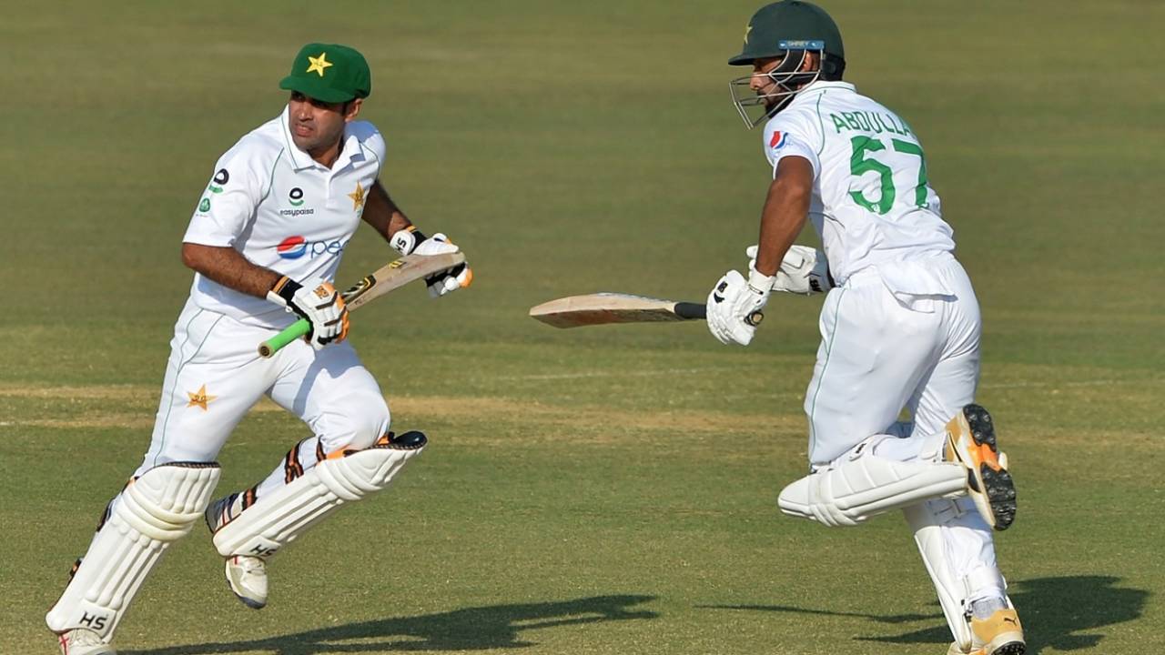 Abid Ali and Abdullah Shafique run between the wickets&nbsp;&nbsp;&bull;&nbsp;&nbsp;AFP/Getty Images