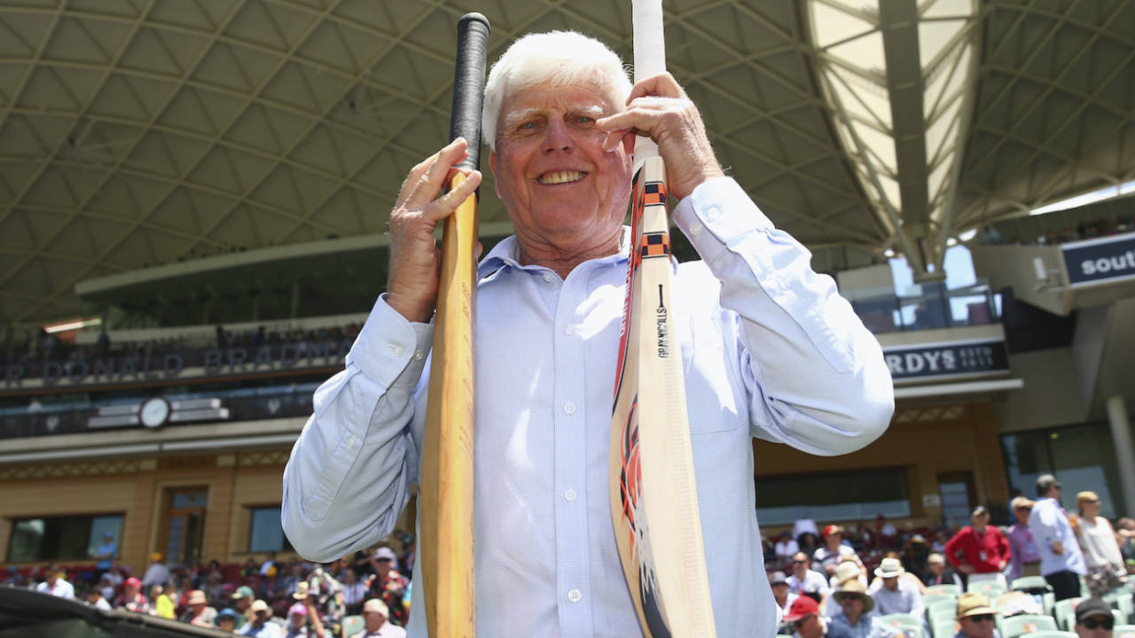 Barry Richards holds the bat with which he made 325 in a day at the WACA in 1970 in his right hand, and David Warner's modern-day weapon in his left, Australia v New Zealand, 3rd Test, Adelaide, November 27, 2015