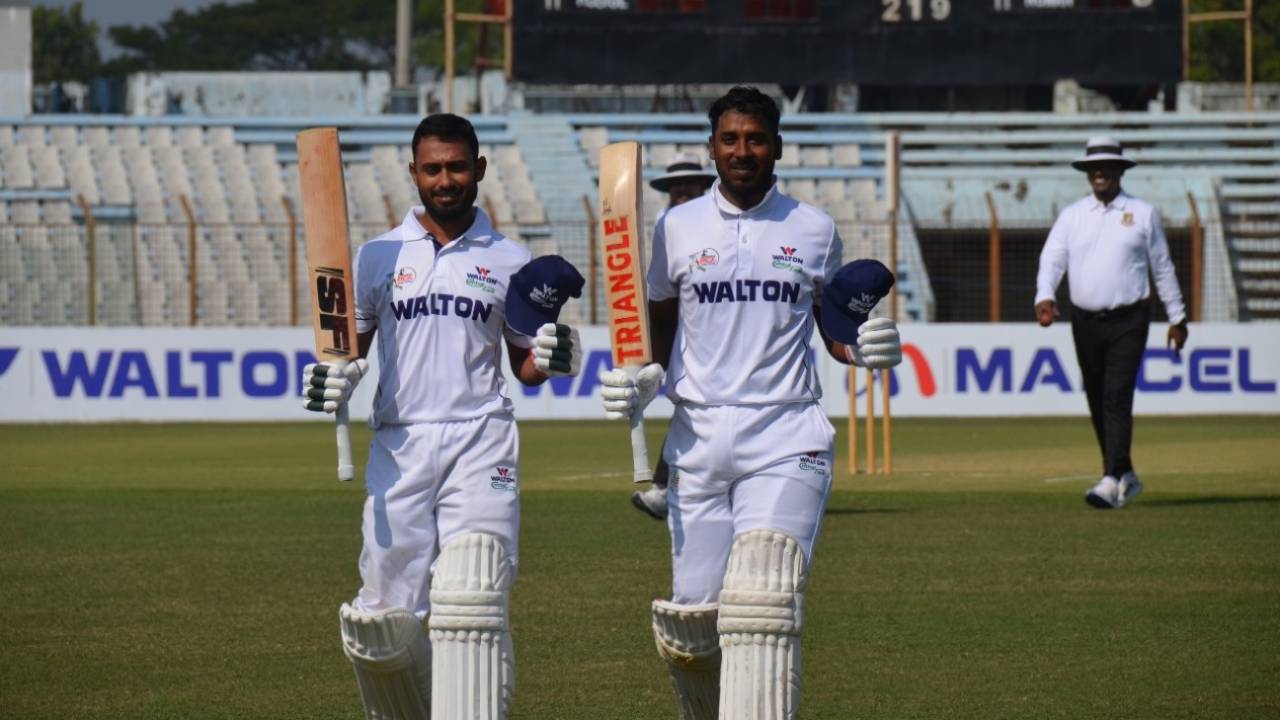 Mohammad Mithun (left) and Mizanur Rahman walk off at an interval during their 327-run opening stand, Central Zone vs North Zone, Bangladesh Cricket League, December 15, 2021