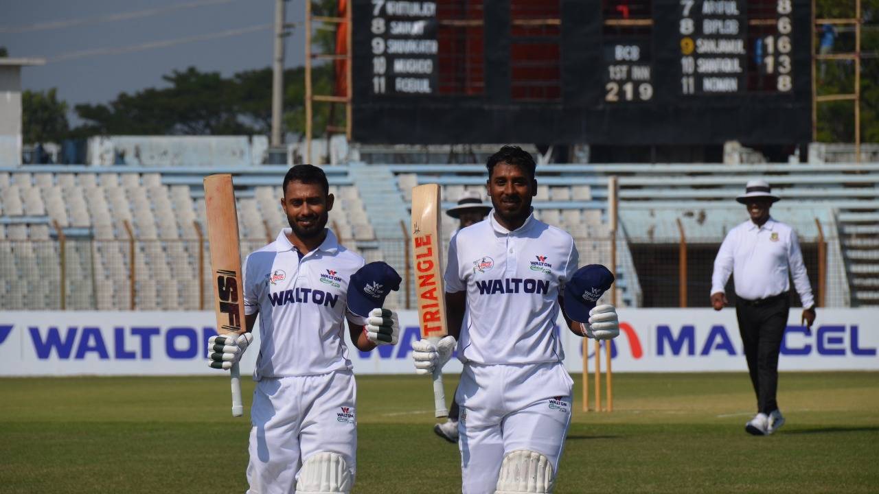 Mohammad Mithun (left) and Mizanur Rahman walk off at an interval during their 327-run opening stand, Central Zone vs North Zone, Bangladesh Cricket League, December 15, 2021