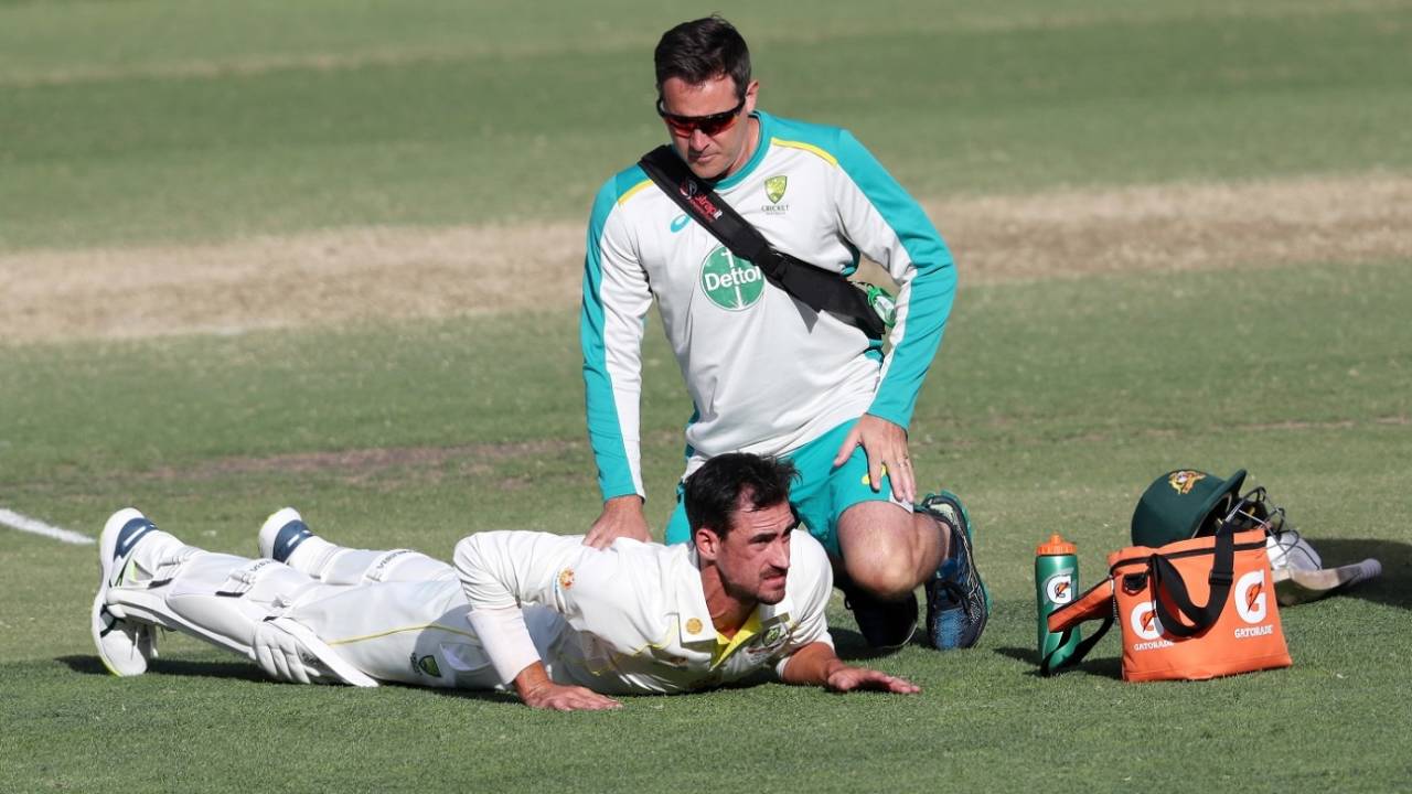Mitchell Starc is attended to by the physio, Australia vs England, 2nd Test, The Ashes, Adelaide, 4th day, December 19, 2021