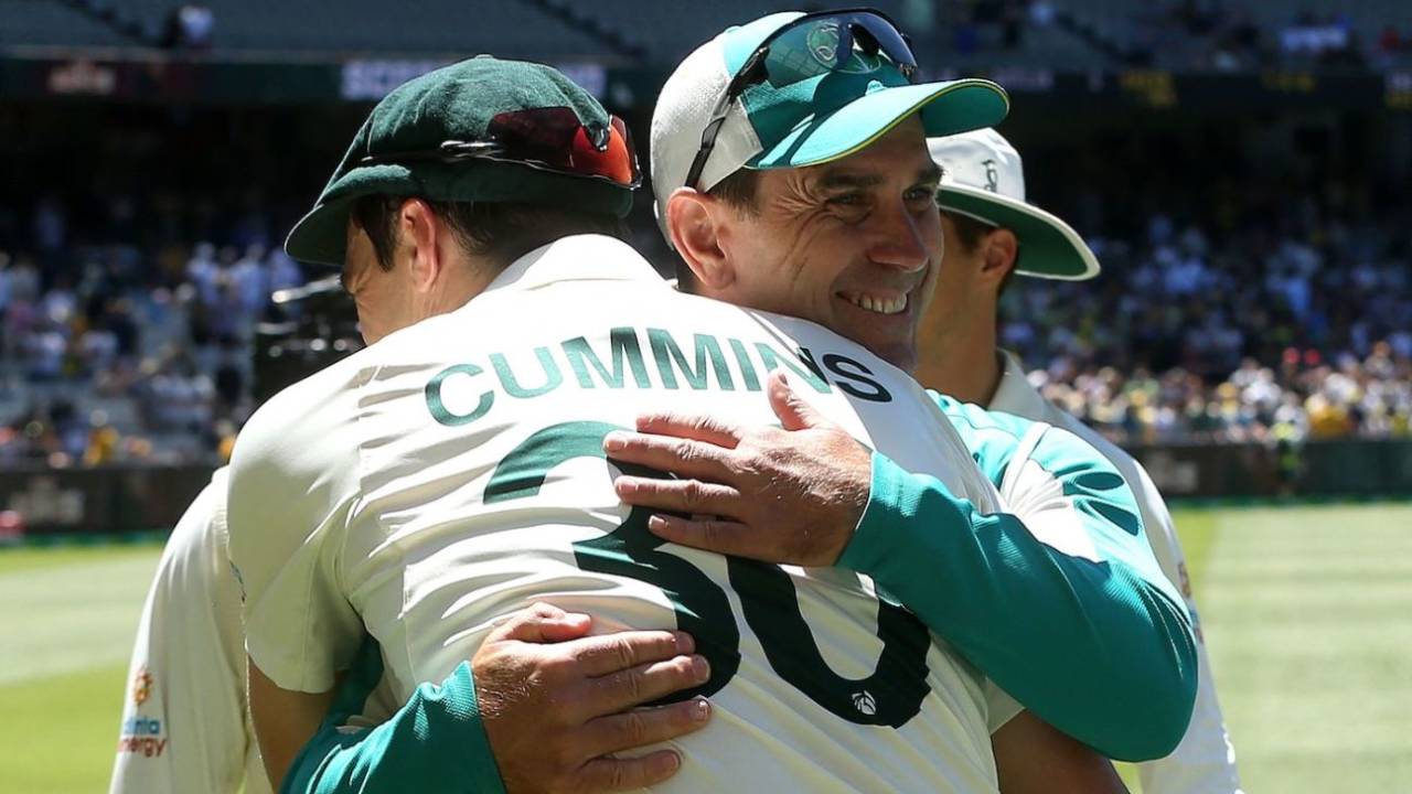 Pat Cummins and Justin Langer hug after Australia's MCG win&nbsp;&nbsp;&bull;&nbsp;&nbsp;AFP/Getty Images