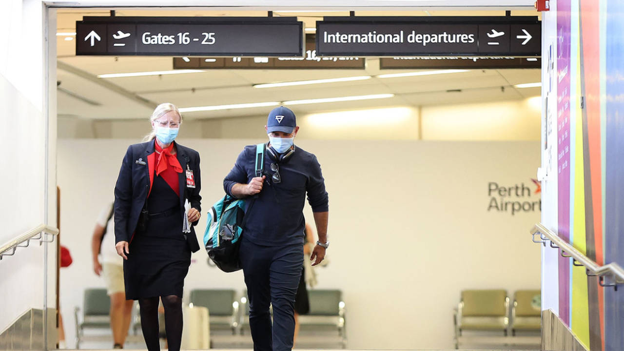 Justin Langer arrives at Perth airport, Perth, February 5, 2022