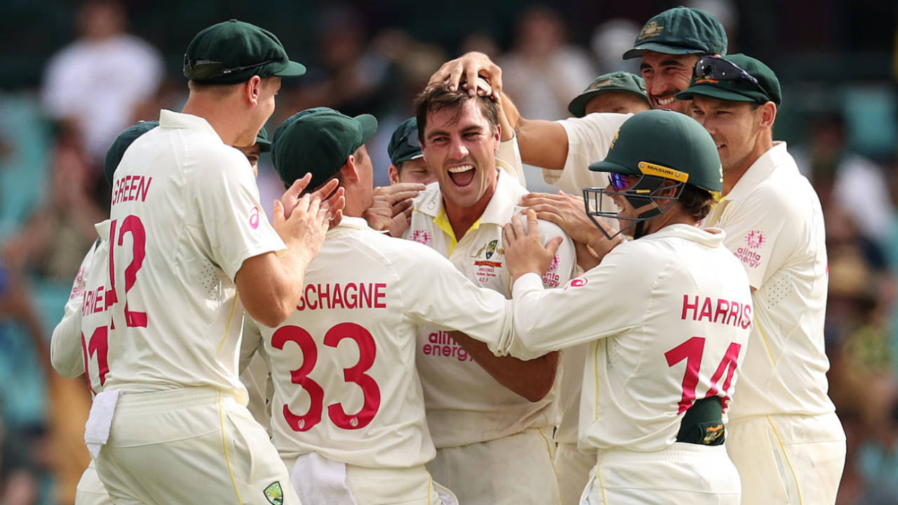Pat Cummins is mobbed by his team-mates, Australia vs England, Men's Ashes, 4th Test, 5th day, Sydney, January 9, 2022
