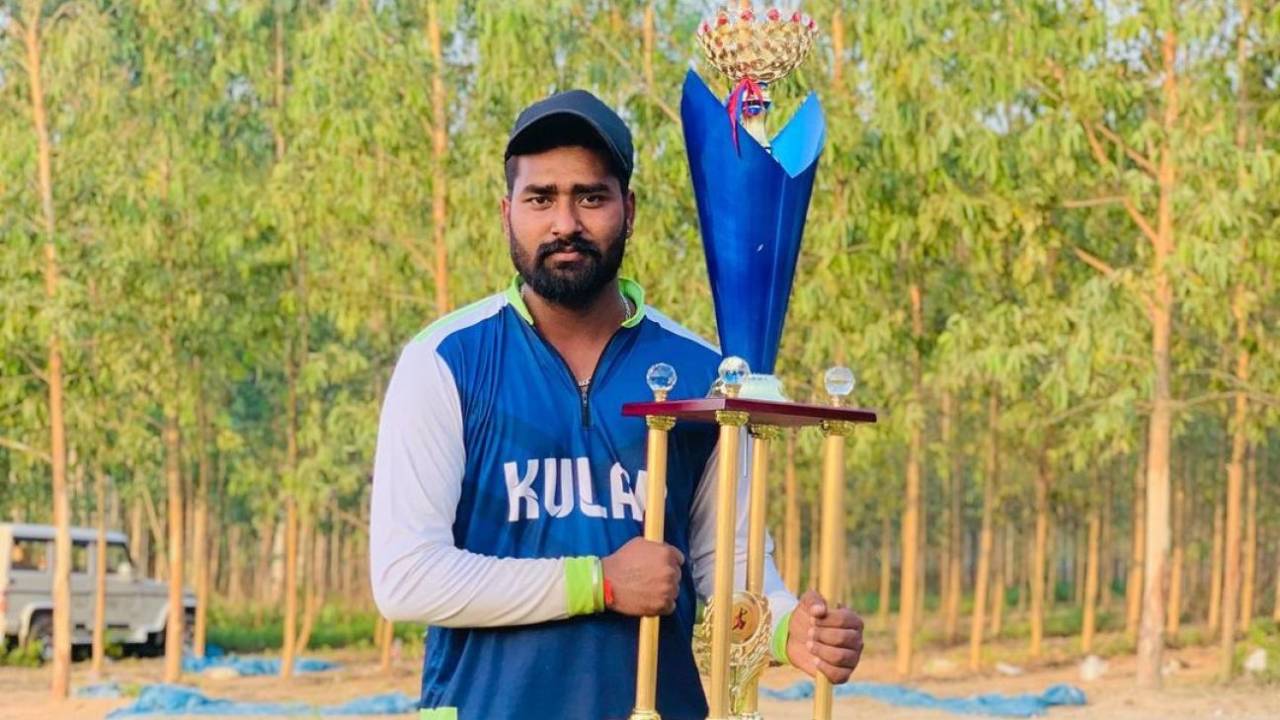 Ramesh Kumar poses with the trophy, April 26, 2021