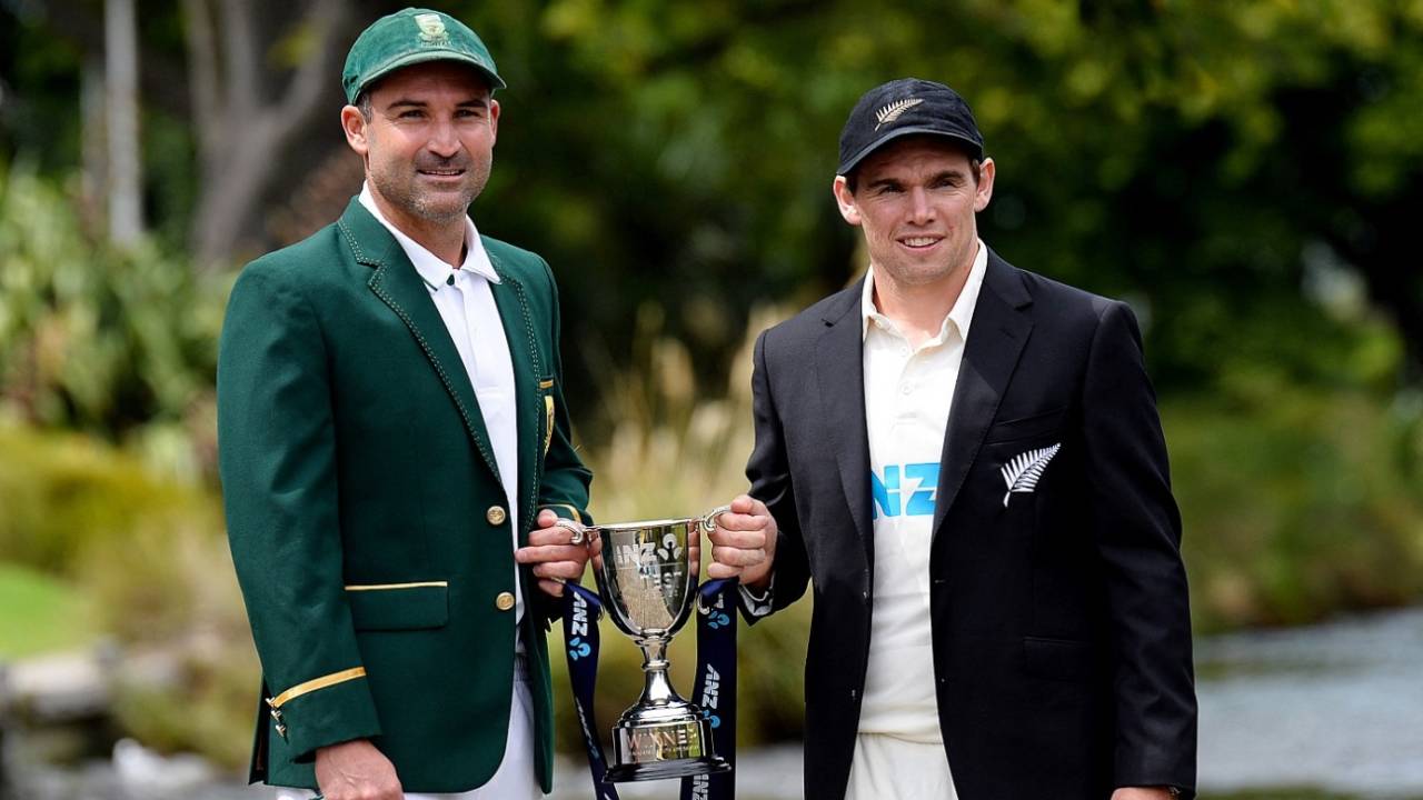 Dean Elgar and Tom Latham pose with the trophy, Christchurch, February 15, 2022