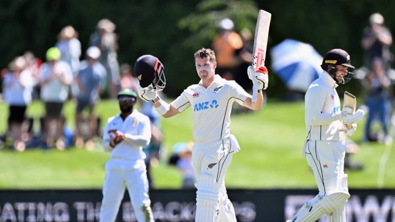 Henry Nicholls raises his bat after reaching his century, New Zealand vs South Africa, 1st Test, Christchurch, 2nd day, February 18, 2022
