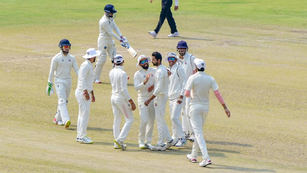Vikas Mishra is mobbed by his team-mates, Delhi vs Jharkhand, 1st day, Ranji Trophy 2021-22, Guwahati, February 24, 2022