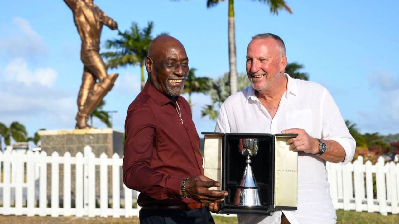 Sir Viv Richards and Sir Ian Botham are all smiles with the Richards-Botham Trophy, North Sound, March 6, 2022