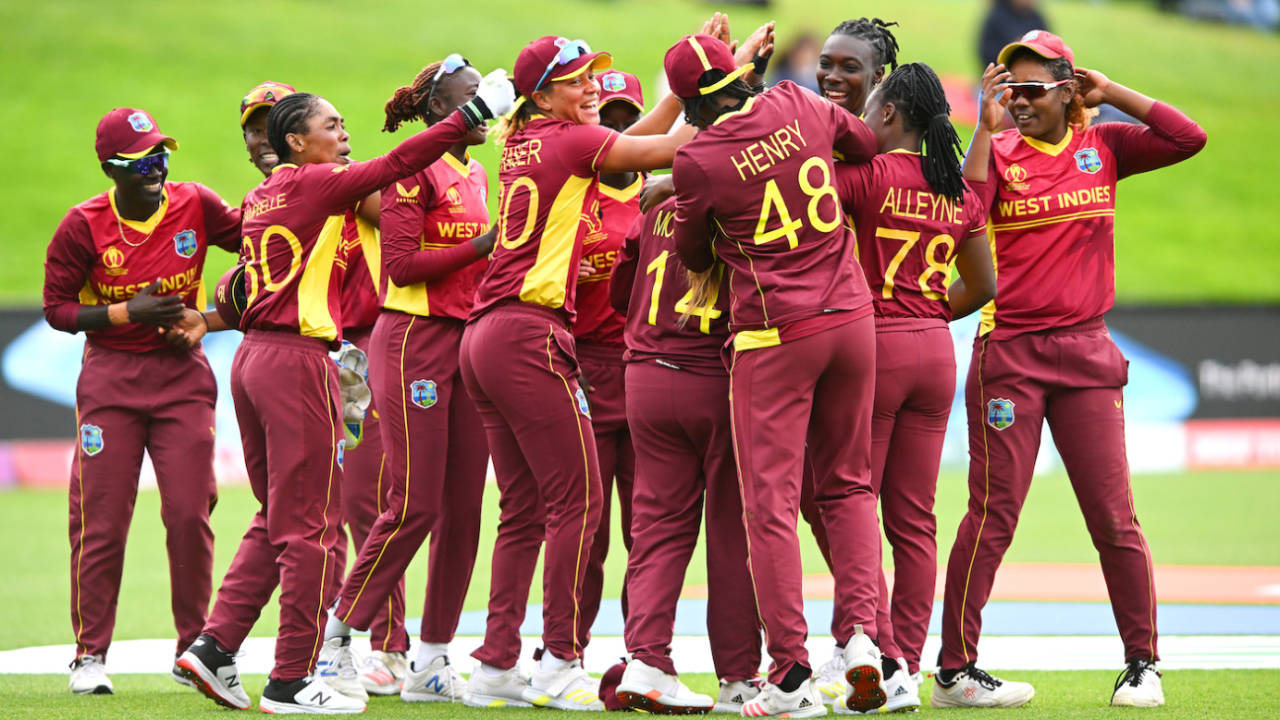 Anisa Mohammed is mobbed by her team-mates after West Indies' win, England vs West Indies, Women's World Cup 2022, Dunedin, March 9, 2022