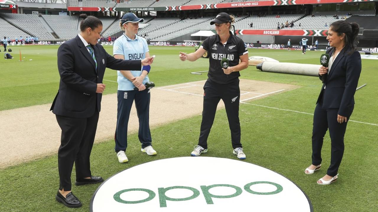 Match referee Shandre Fritz hands over the coin to Sophie Devine as Heather Knight, Lisa Sthalekar watch, New Zealand vs England, Women's World Cup 2022, Auckland, March 20, 2022