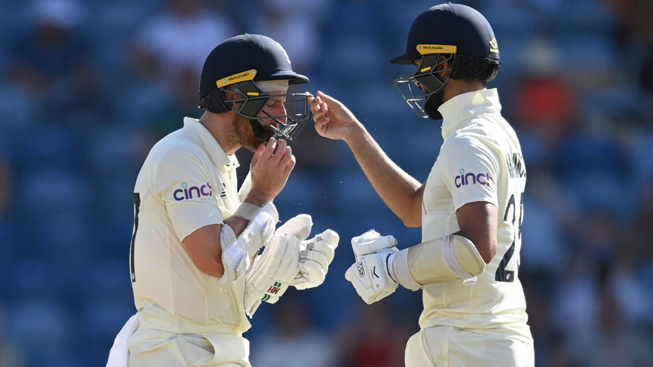 Saqib Mahmood helps Jack Leach wipe the sweat off his glasses, West Indies vs England, 3rd Test, Grenada, 1st day, March 24, 2022
