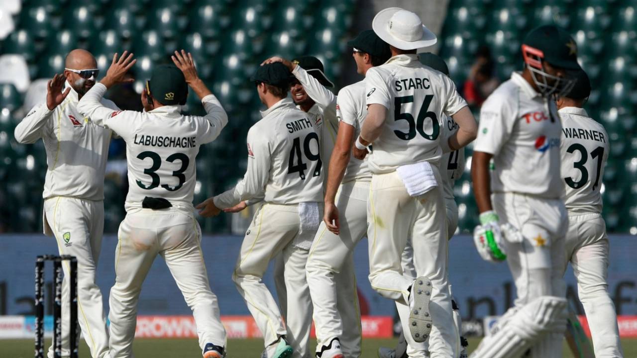 Nathan Lyon celebrates with team-mates, as Babar Azam walks back, Pakistan vs Australia, 3rd Test, Lahore, 5th day, March 25, 2022