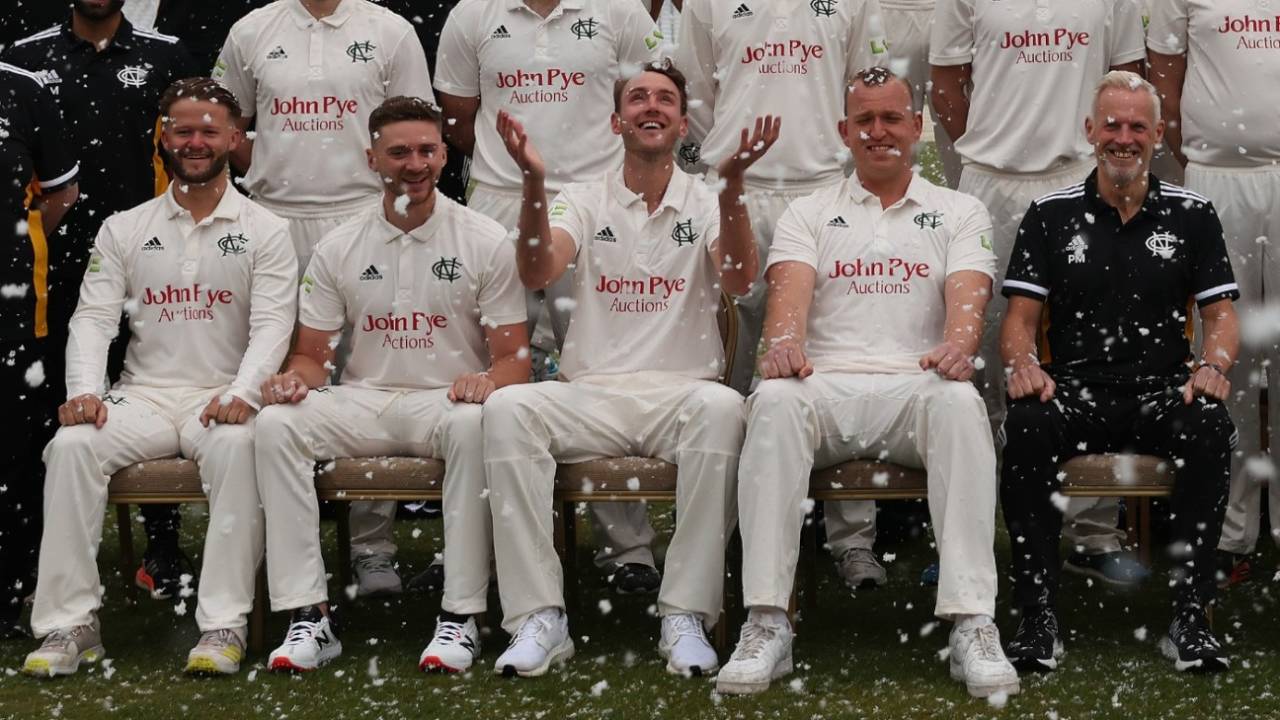 Stuart Broad reacts to a flurry of snow as Nottinghamshire line up for their team photo, Trent Bridge, March 31, 2022