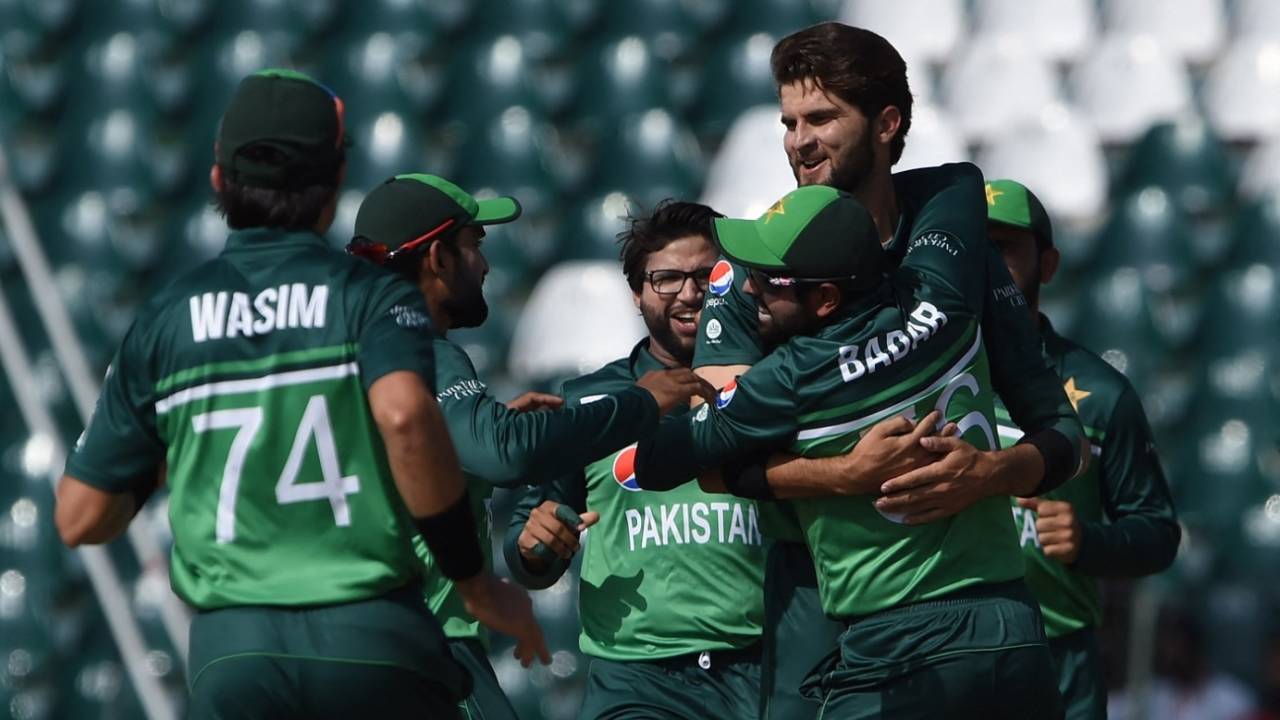 Shaheen Shah Afridi is engulfed by his team-mates after dismissing Travis Head on the first ball, Pakistan vs Australia, 3rd ODI, Lahore, April 2, 2022