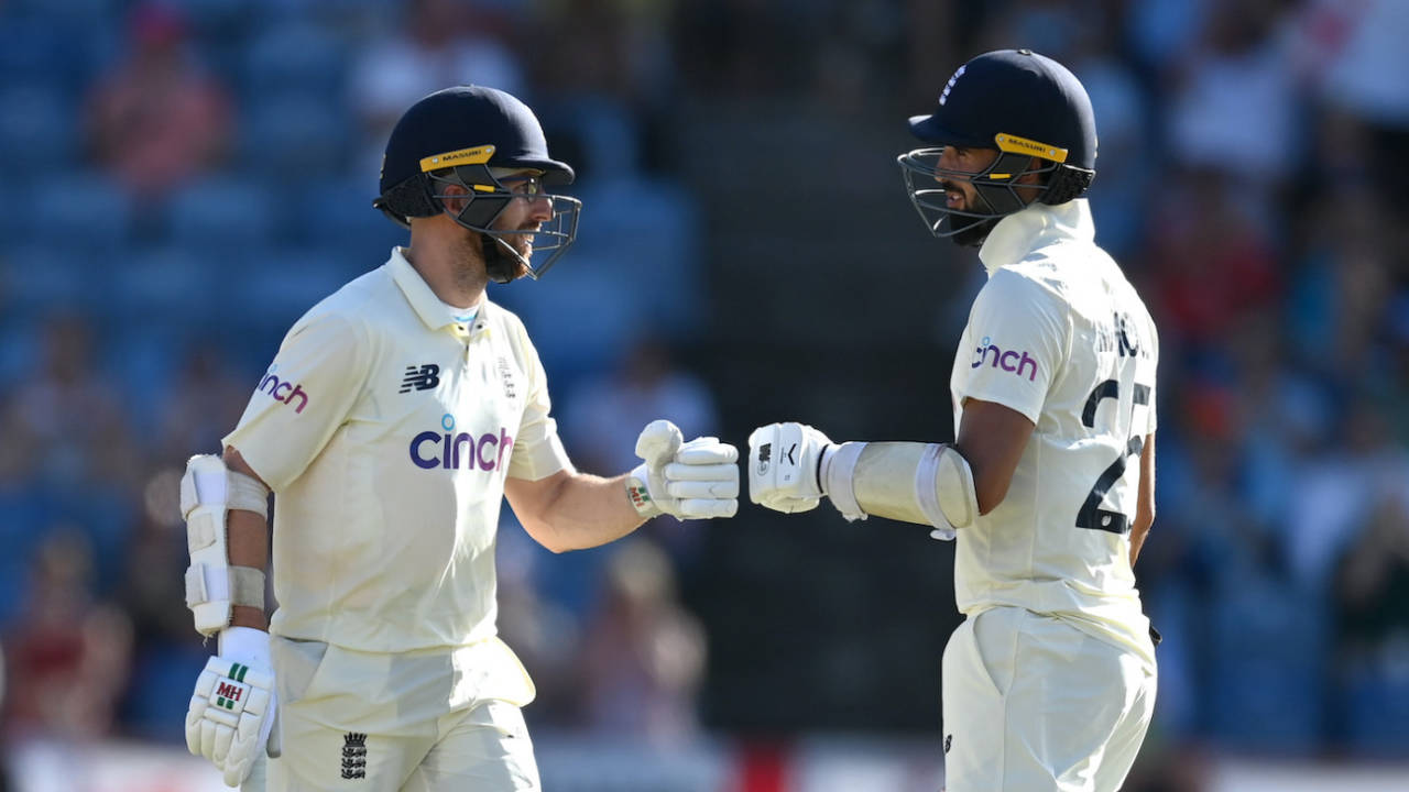 Jack Leach and Saqib Mahmood bump gloves during their last-wicket stand of 90, West Indies vs England, 3rd Test, Grenada, 1st day, March 24, 2022