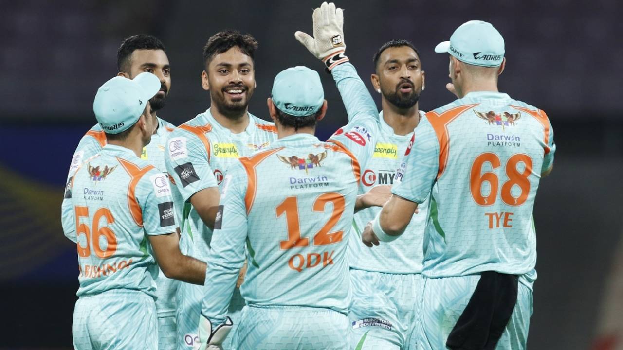 Avesh Khan is mobbed by his team-mates after producing a double-strike, Lucknow Super Giants vs Sunrisers Hyderabad, IPL 2022, Mumbai, April 4, 2022