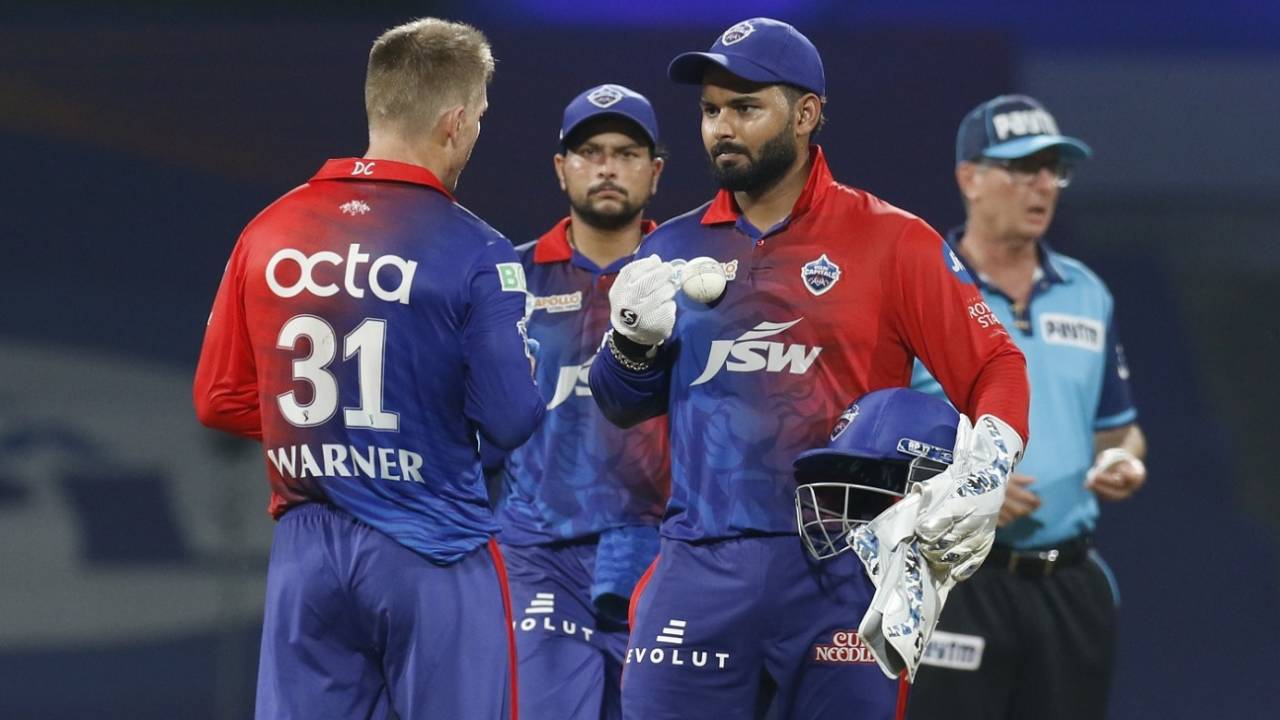 Rishabh Pant and David Warner have a chat after Anrich Nortje had to be taken off the attack, Lucknow Super Giants vs Delhi Capitals, IPL 2022, Navi Mumbai, April 7, 2022