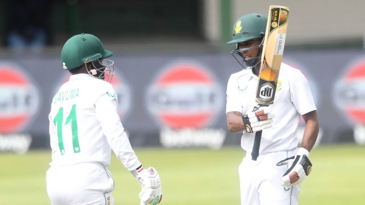 Keegan Petersen raises his bat after reaching his half century, South Africa v Bangladesh, 2nd Test, Gqeberha, 1st day, April 8, 2022