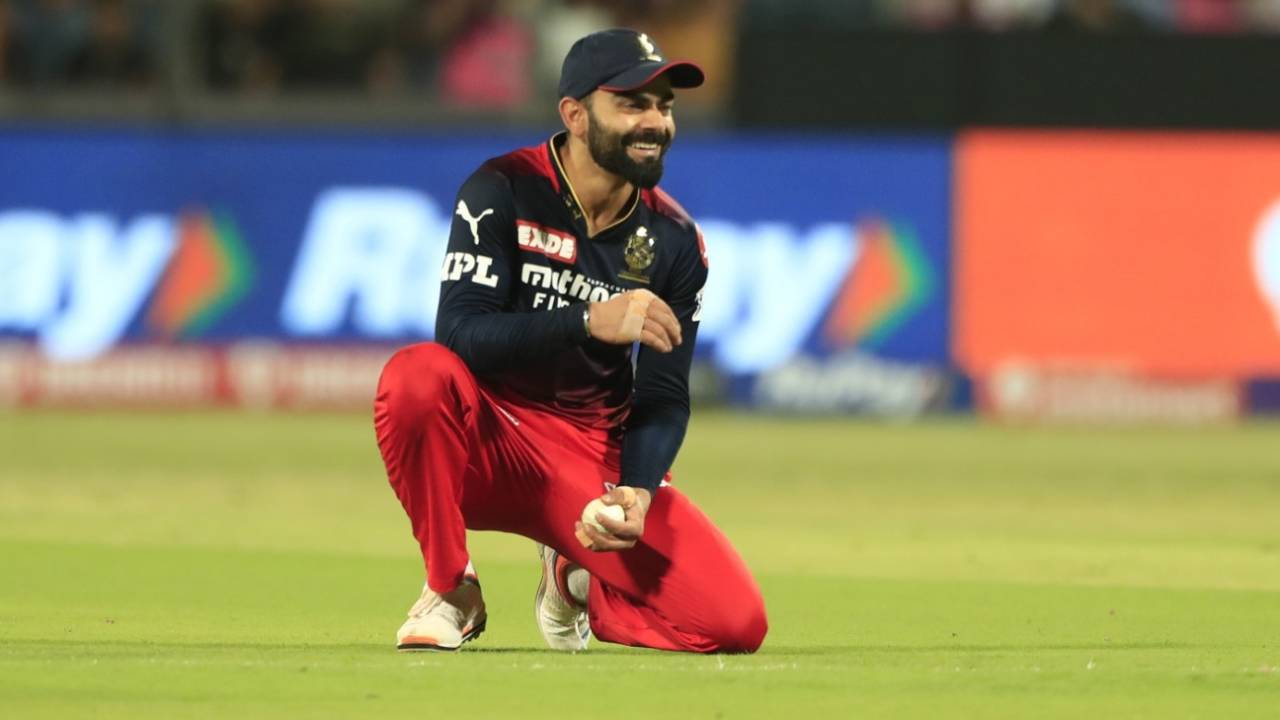Virat Kohli has something to smile about as he completes a terrific catch to send back Trent Boult, Rajasthan Royals vs Royal Challengers Bangalore, IPL 2022, Pune, April 26, 2022