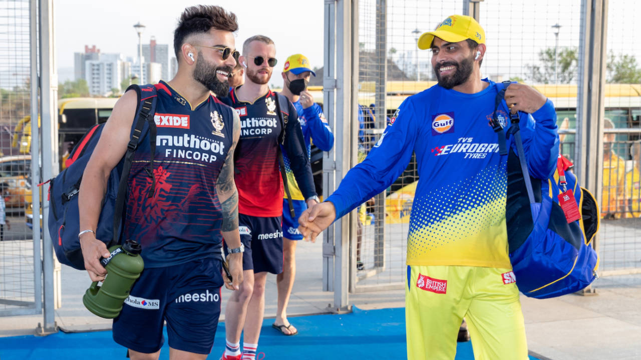 Virat Kohli and Ravindra Jadeja share a lighthearted moment as they enter the ground for an important game, Chennai Super Kings vs Royal Challengers Bangalore, IPL 2022, Pune, 4 May 2022