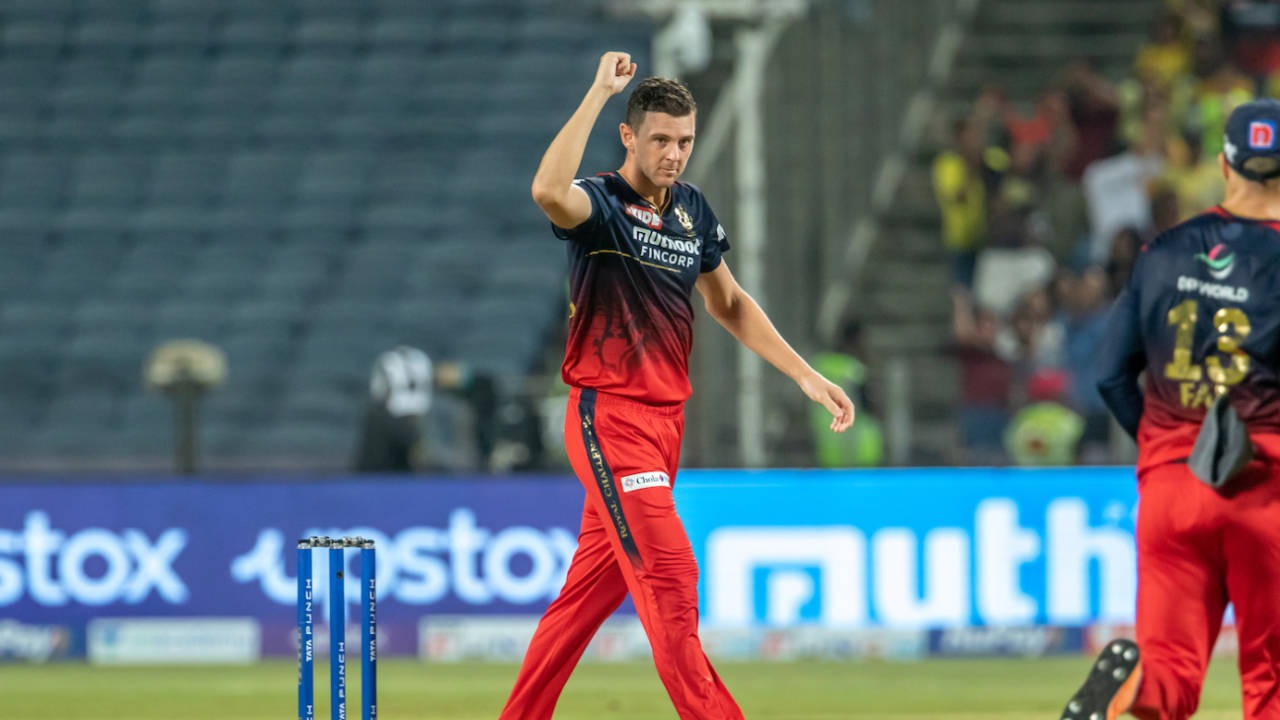 Josh Hazlewood celebrates after effectively sealing the game for RCB by removing CSK's captain, MS Dhoni, Chennai Super Kings vs Royal Challengers Bangalore, IPL 2022, Pune, May 4, 2022
