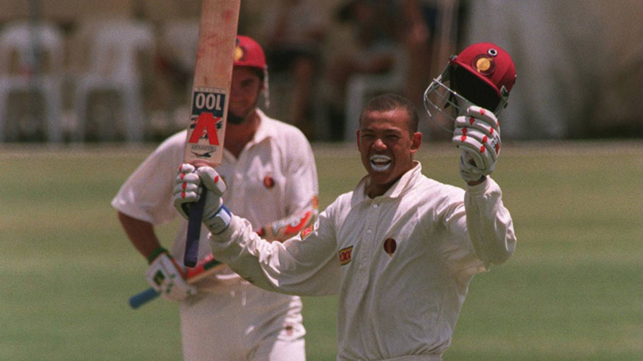 Andrew Symonds brings up his century against England during the 1994 Ashes tour&nbsp;&nbsp;&bull;&nbsp;&nbsp;Getty Images
