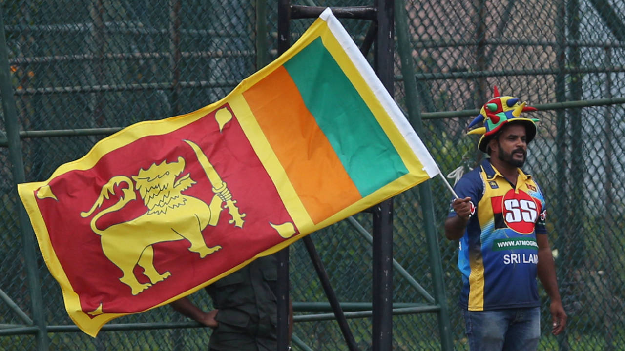 A Sri Lankan cricket fan cheers his team on, Colombo, August 22, 2019