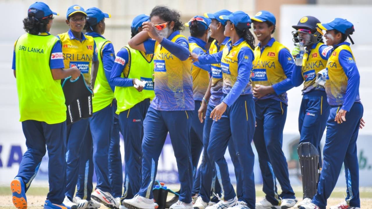 Sri Lanka players celebrate the fall of a wicket against Pakistan, Pakistan vs Sri Lanka, 3rd women's ODI, Karachi, June 5, 2022