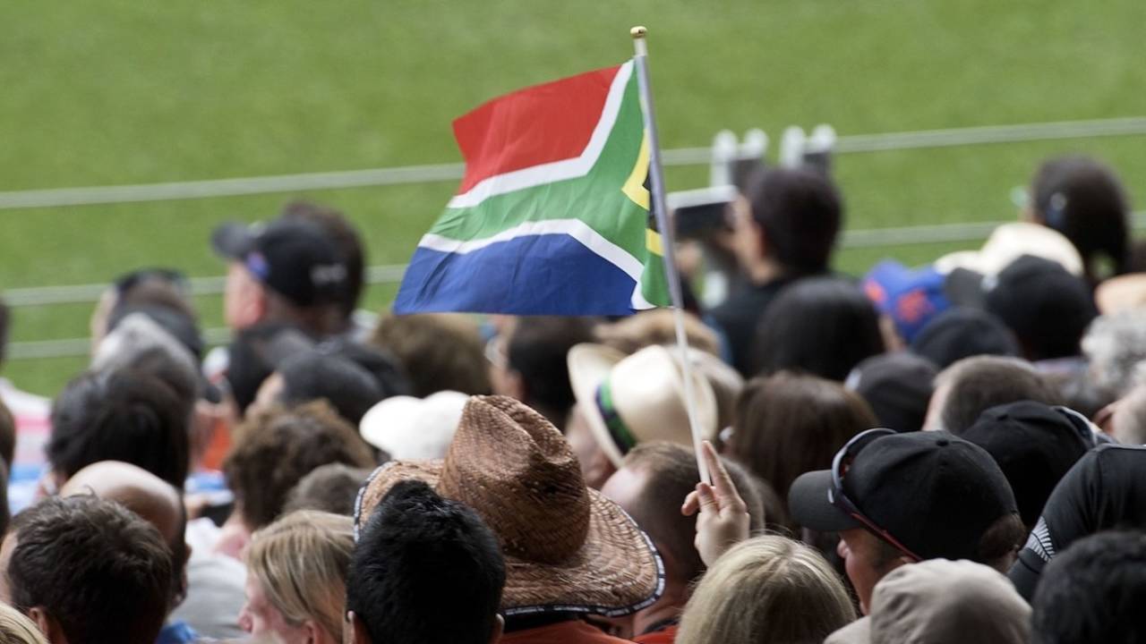 A South African flag is waved during the World Cup semi-final between New Zealand and South Africa at Eden Park, Auckland, March 24, 2015