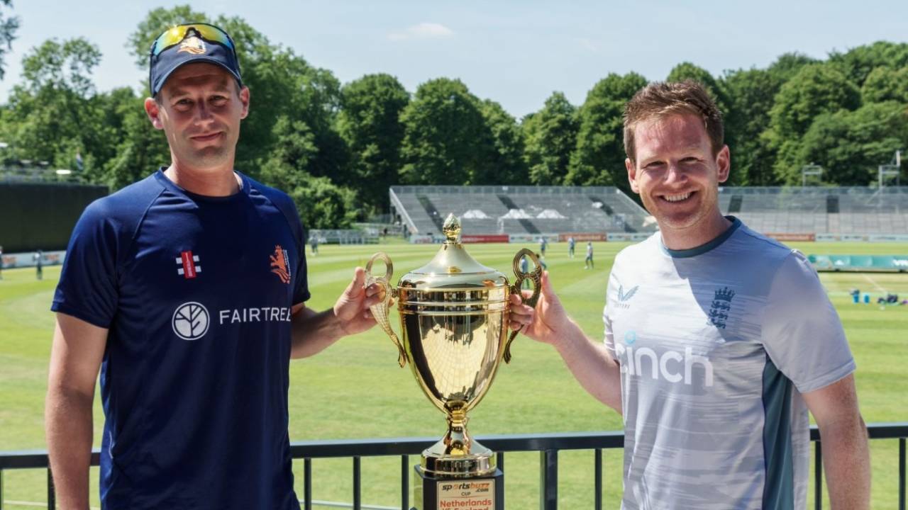 Pieter Seelaar and Eoin Morgan pose with the series trophy, Netherlands vs England, 1st ODI, Amstelveen, June 16, 2022