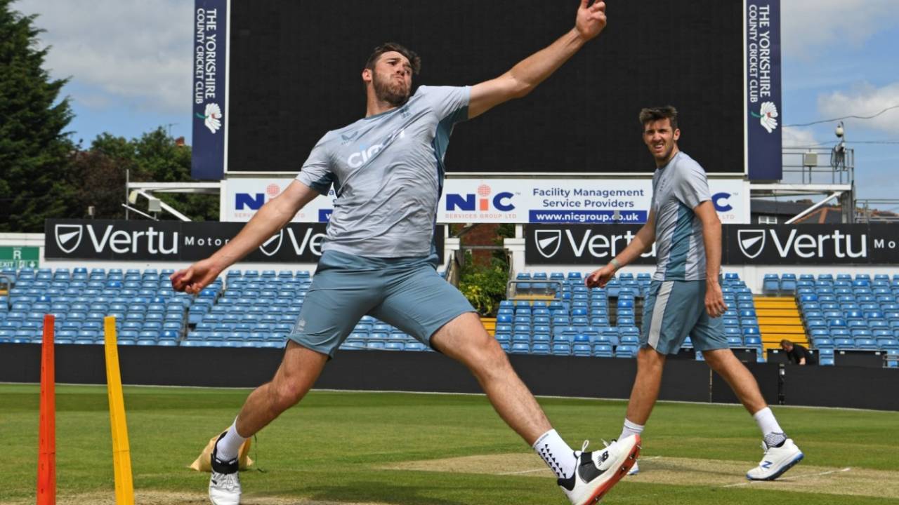 Jamie Overton bowls ahead of his Test debut, as brother Craig looks on, June 21, 2022