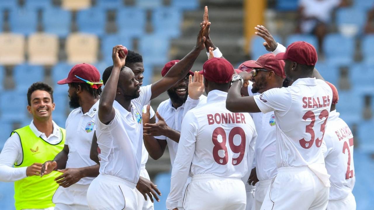 Team-mates share in Kemar Roach's joy at securing 250 wickets, West Indies vs Bangladesh, 2nd Test, St Lucia, 3rd day, June 26, 2022