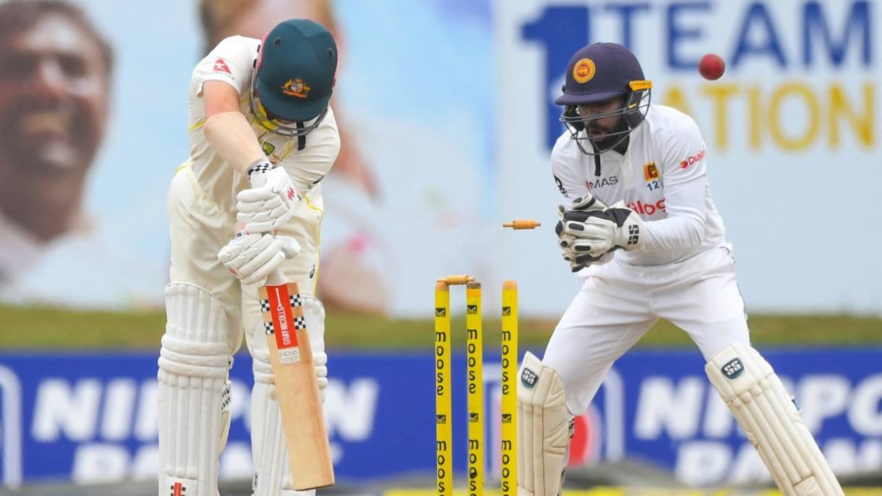 Travis Head was bowled by Ramesh Mendis in his last innings of the series&nbsp;&nbsp;&bull;&nbsp;&nbsp;AFP/Getty Images