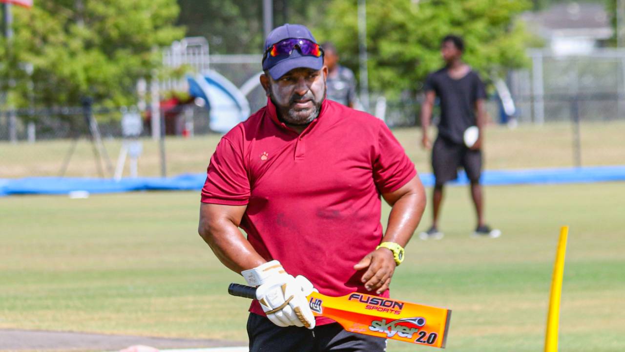 Nepal head coach Pubudu Dassanayake hits catches during pregame warmups, USA v Nepal, ICC Cricket World Cup League Two, Pearland, June 11, 2022