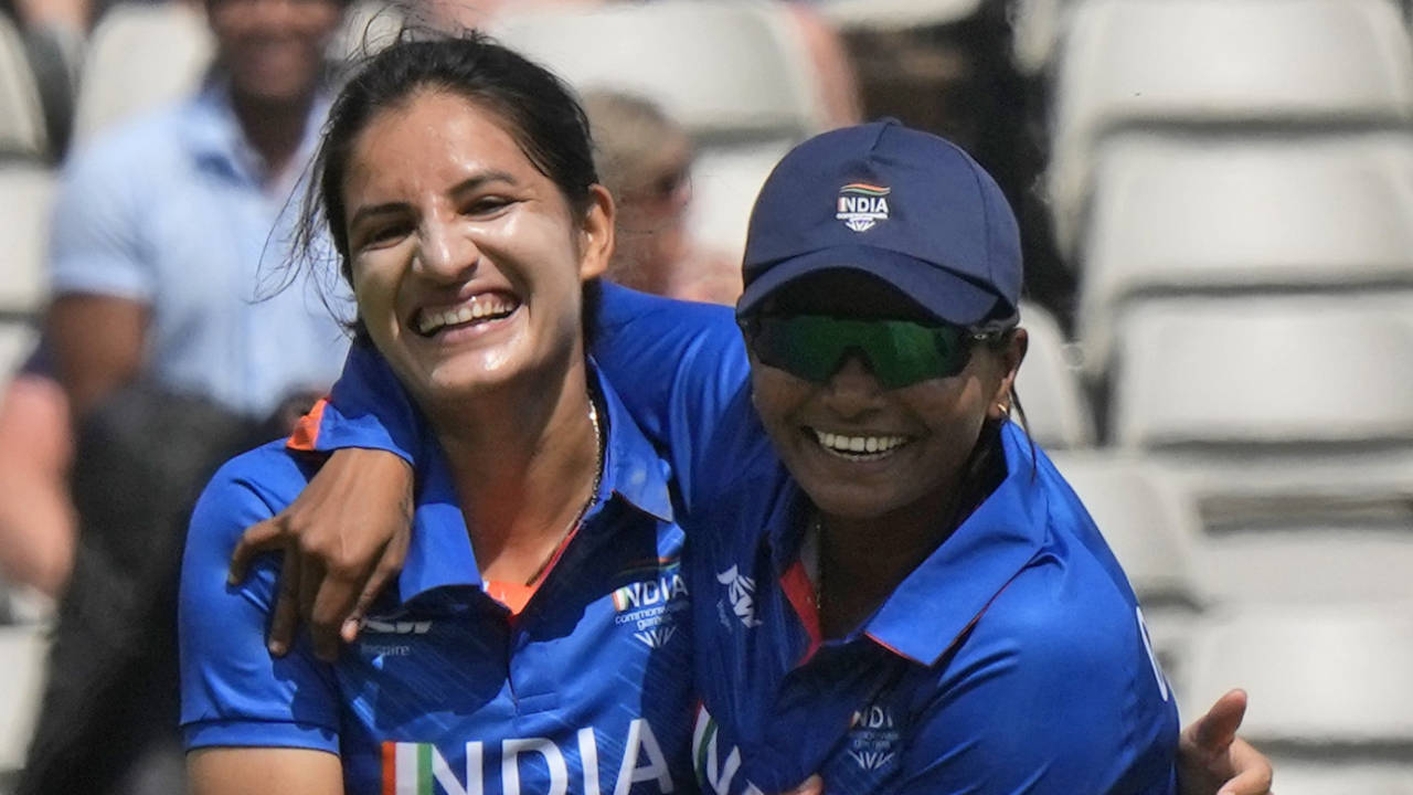Renuka Singh Thakur (L) celebrates after dismissing Tahlia McGrath, one of her four wickets in the powerplay, Australia vs India, Commonwealth Games, Birmingham, July 29, 2022