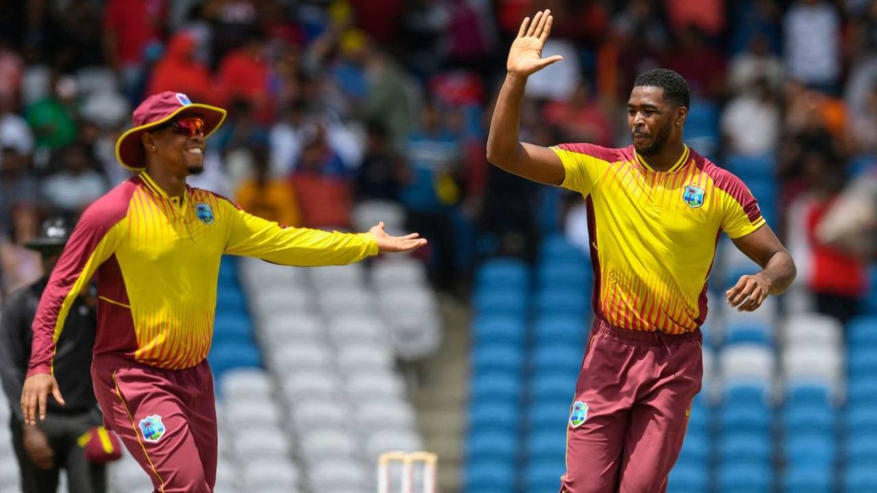 Obed McCoy celebrates with Shimron Hetmyer after removing Shreyas Iyer, West Indies vs India, 1st T20I, Tarouba, July 29, 2022
