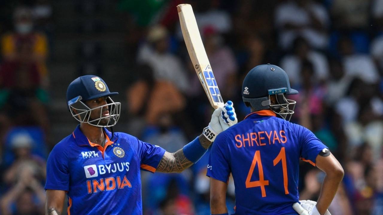 Suryakumar Yadav raises his bat after scoring a fifty as Shreyas Iyer looks on, West Indies vs India, 3rd T20I, Basseterre, August 2, 2022